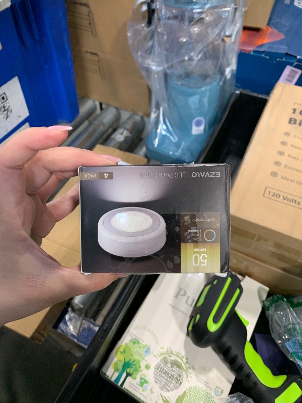 Photo 1 of ***MISSING ONE*** EZVALO LED Puck Lights, 50Lumens, Touch Light, 2.5'' Mini Tap Light, Rechargeable Sitck On Tap Lamp, 3 Color Temps, Under Cabinet Lights Wireless, Ideal for Kitchen,Closet,Pantry,Camper(4 Pack)