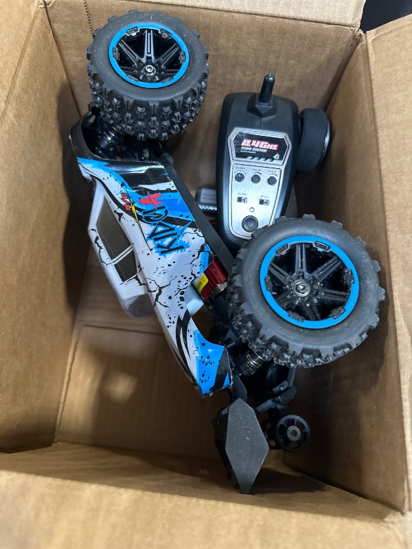 Photo 1 of *UNTESTED*
Scientoy 1/14 RC Cars Fast 50 KPH, 4WD Offroad RC Truck with 60 Mins Runtime, All Terrain High Speed Remote Control Car with 2 Rechargeable Batteries 2000 mAh, RC Cars for Adults and Boy Gifts