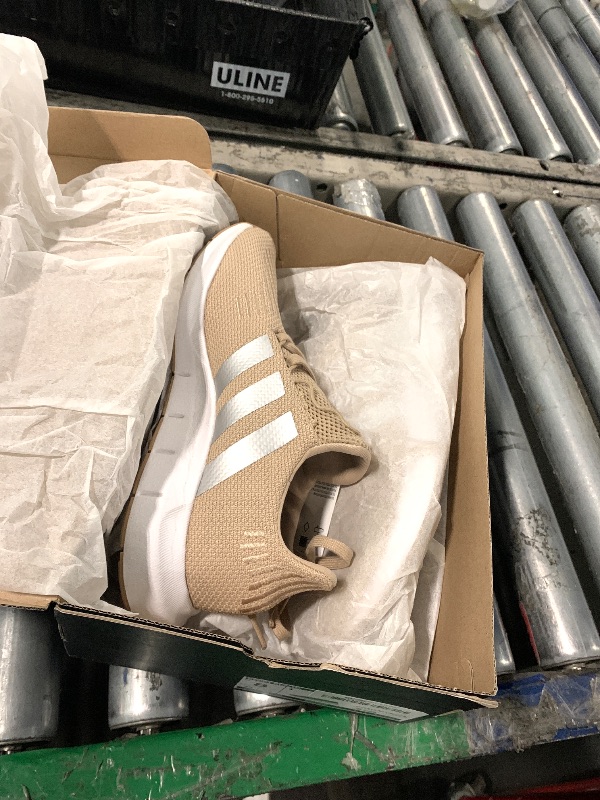 Photo 1 of ****FINAL SALE NOT RETURNS****
*****They are broken where the straps attach***
Adidas Women's Swift Run 1.0, Warm Sandstone/Silver Metallic/White, 8
