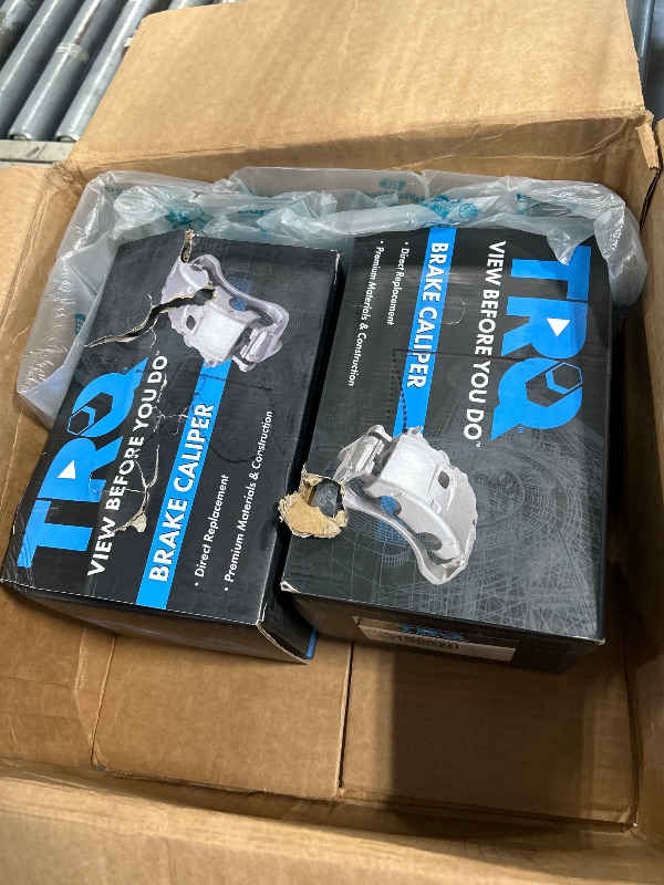 Photo 1 of  2 boxes of TRQ Rear Driver and Passenger Side Brake Caliper Set Caliper Brackets Hardware Compatible with 10-23 Lexus GX460 03-09 GX470 96-97 LX450 10-22 Toyota 4Runner 93-97 Land Cruiser 01-07 Sequoia