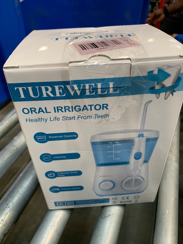 Photo 1 of ** VERY USED** TUREWELL Water Flossing Oral Irrigator, 600ML Dental Cleaner 10 Adjustable Pressure, Electric Oral Flosser for Teeth/Braces, 8 Replacement Jet Tips for Family (White)