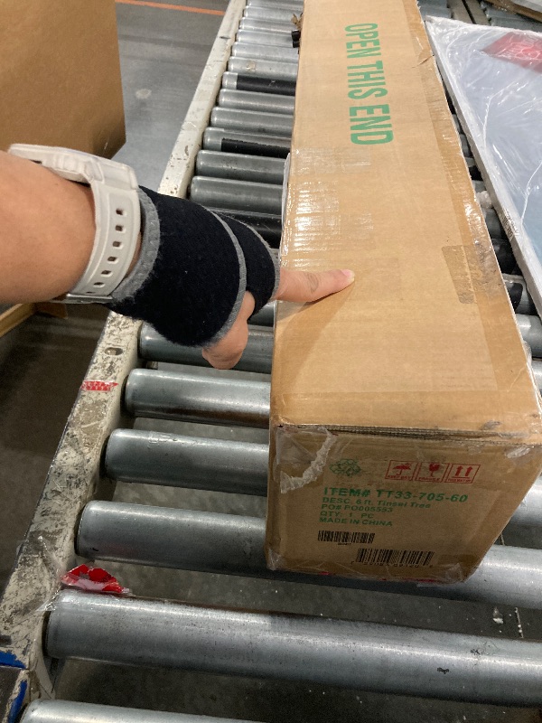 Photo 1 of National Tree Company Artificial Christmas Tree, Red Tinsel, Includes Stand, 6 feet