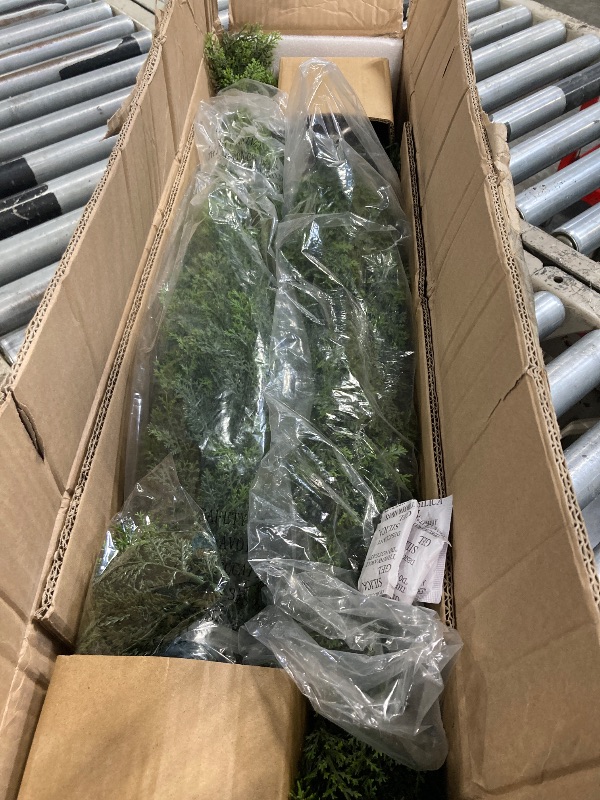 Photo 1 of ***SIMILAR***Yangrass 4FT Artificial Cedar Topiary Tree Set of 2, Faux Evergreen Pine Shrubs Plants with Pot, Realistic Fake Plants for Indoors Outdoors Front Porch Christmas Decor