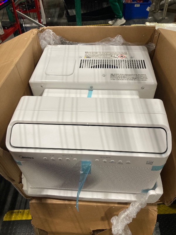 View 4 of *** NEW/ IT HAS A DENT, BUT IT WORKS ***** 
 Midea 10,000 BTU U Shaped Smart Inverter Window Air Conditioner - Cools 450 Sq Ft, Ultra Quiet with Open Window Flexibility - Alexa/Google Assistant Compatible - 35% Energy Savings, Remote (Updated)