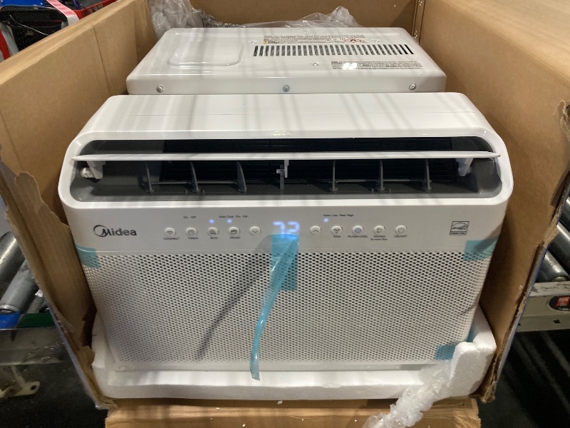 View 2 of *** NEW/ IT HAS A DENT, BUT IT WORKS ***** 
 Midea 10,000 BTU U Shaped Smart Inverter Window Air Conditioner - Cools 450 Sq Ft, Ultra Quiet with Open Window Flexibility - Alexa/Google Assistant Compatible - 35% Energy Savings, Remote (Updated)