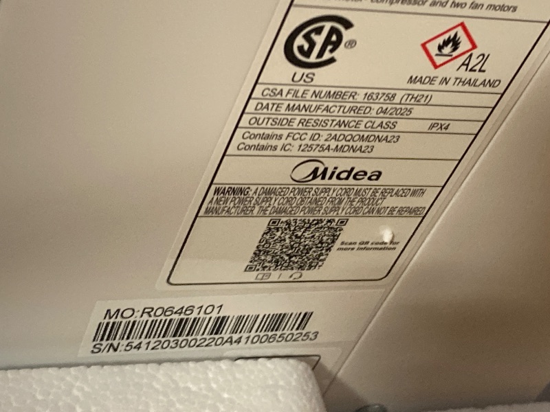 View 3 of *** NEW/ IT HAS A DENT, BUT IT WORKS ***** 
 Midea 10,000 BTU U Shaped Smart Inverter Window Air Conditioner - Cools 450 Sq Ft, Ultra Quiet with Open Window Flexibility - Alexa/Google Assistant Compatible - 35% Energy Savings, Remote (Updated)