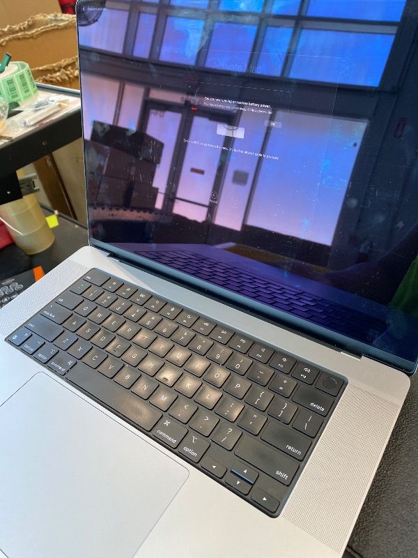 Photo 1 of **need apple support **NOT TESTED** **NO CHARGER INCLUDED** Apple MacBook Pro Late 2021 with Apple M1 Pro chip (16-inch, 16GB RAM, 512GB SSD) Space Gray (Renewed)