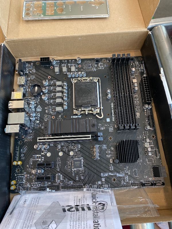 Photo 1 of ***MAJOR DAMAGE*** MSI PRO B760M-P DDR4 ProSeries Motherboard (Supports 12th/13th/14th Gen Intel Processors, LGA 1700, DDR4, PCIe 4.0, M.2, USB 3.2 Gen2, HDMI/DP, mATX)