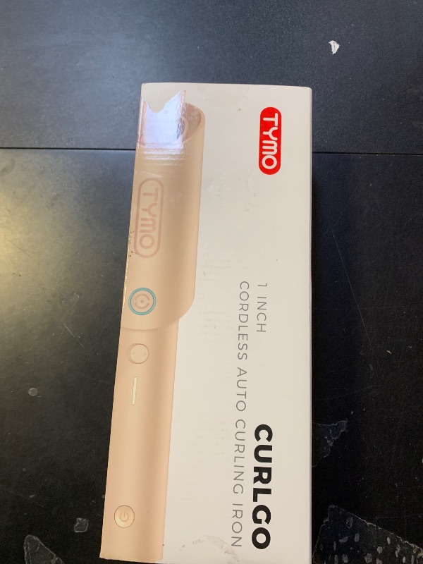 Photo 1 of curling iron cordless