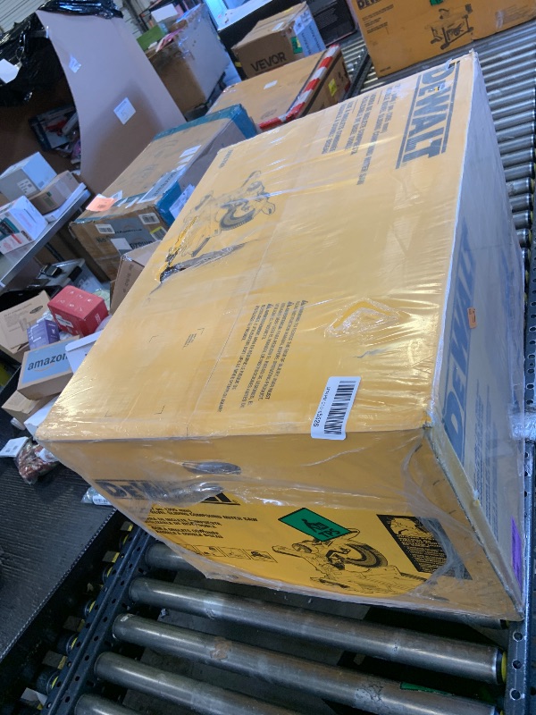 Photo 1 of DEWALT Miter Saw, 12-inch Double Bevel Sliding Compound Miter Saw with XPS LED Shadow Light System, Includes Blade Wrench, Material Clamp and Dust Bag (DWS780)