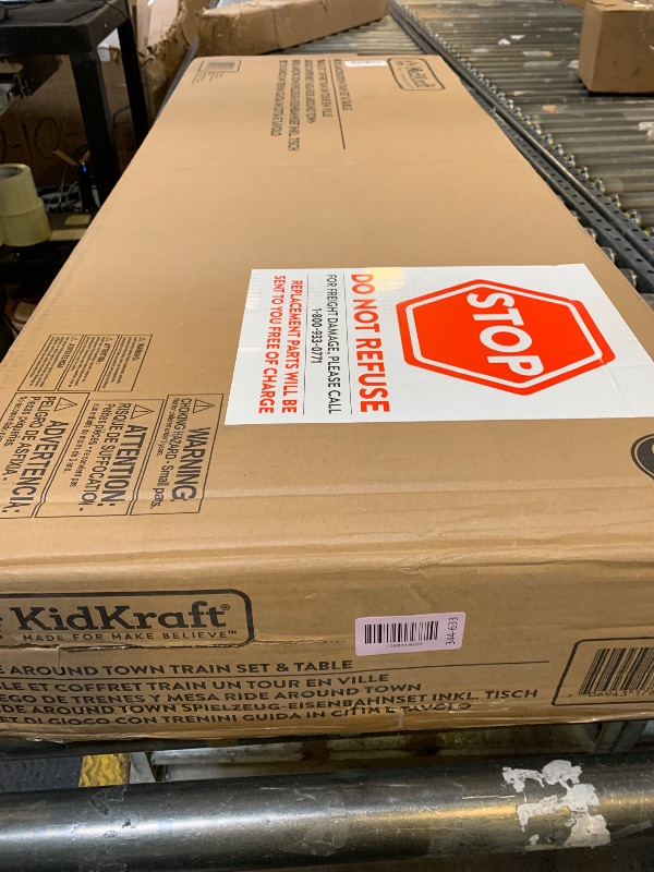 Photo 1 of KidKraft Ride Around Town Wooden Train Set and Table with Helicopter, Airplane, Farm, Storage Bins and 100 Pieces, Compatible with Other Major Brand Trains, Honey