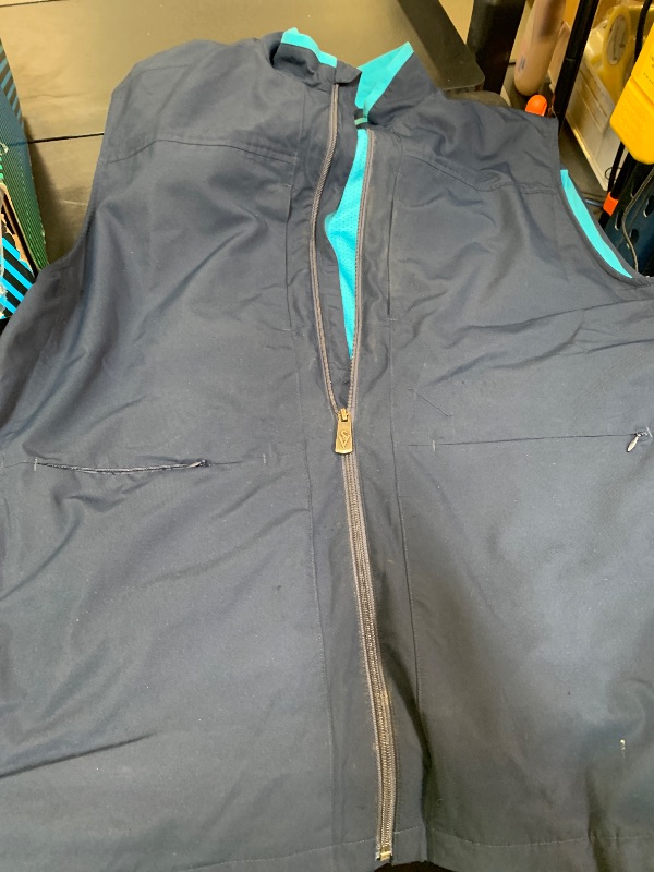 Photo 1 of SCOTTeVEST Best Travel Vest for Men - 26 Hidden Pockets - Water Repellent for Travel & More (Midnight Blue/Aqua, Large Tall)
