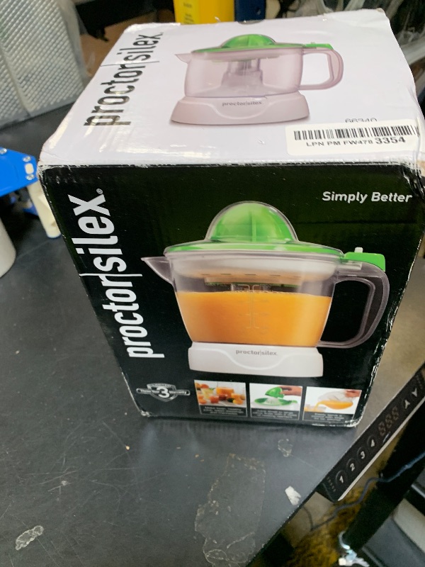 Photo 1 of **SELLINNG FOR PARTS**Proctor Silex Electric Citrus Juicer Machine, Large 34 oz. Pitcher, Pressure Activated, 2 Reamers for Big and Small Fruit, Pulp Control, for Orange, Lemon, Grapefruit Juice, White & Green (66340)