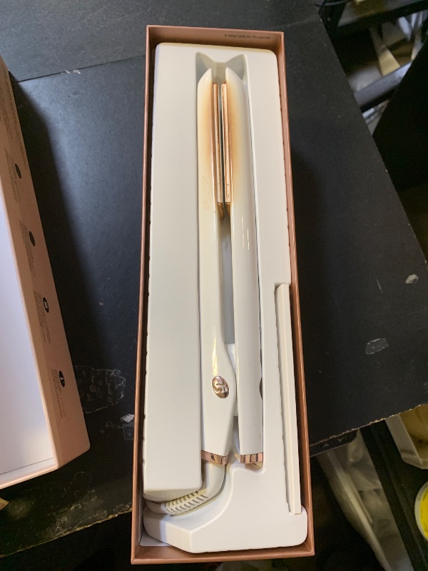 Photo 1 of T3 SinglePass Smooth X Professional Flat Iron with Extra-Long Ceramic Plates for Faster Styling, 9 Heat Settings for All Hair Types, For Straightening, Curling, and Waving