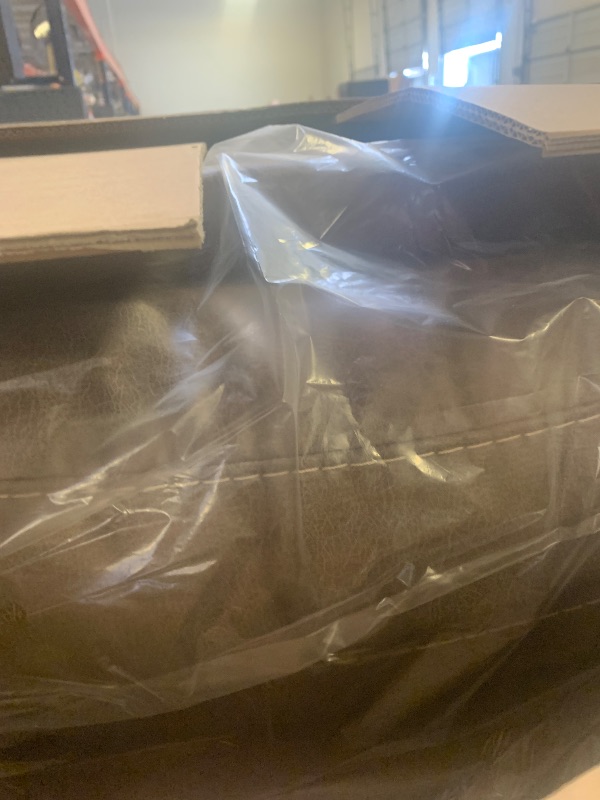 Photo 1 of Signature Design by Ashley Navi Modern Recliner with Rocking Motion, Dark Brown