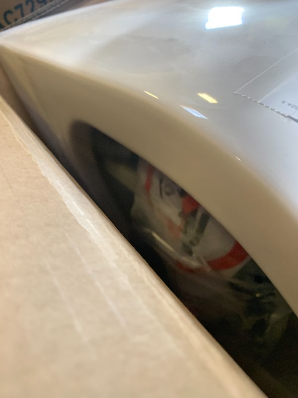 Photo 1 of TOTO RP Wall-Hung Contemporary D-Shape Dual Flush 1.28 and 0.9 GPF Toilet with CEFIONTECT, Cotton White - CT447CFG#01