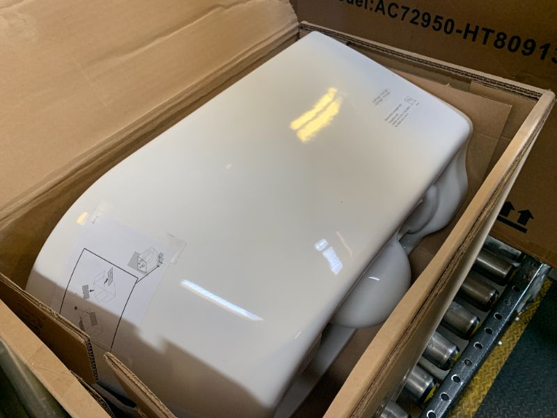 Photo 1 of TOTO RP Wall-Hung Contemporary D-Shape Dual Flush 1.28 and 0.9 GPF Toilet with CEFIONTECT, Cotton White - CT447CFG#01