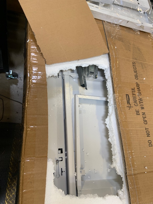 Photo 1 of narrow four drawer file cabinet