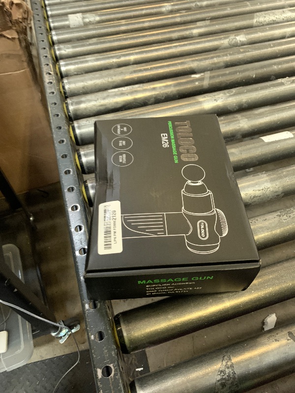 Photo 1 of Percussion massage gun