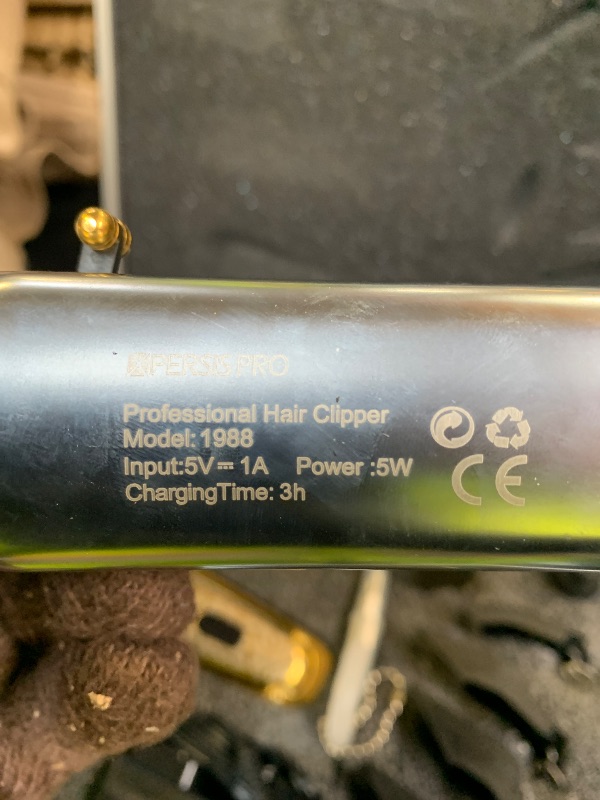 Photo 1 of XPERSIS PRO Cordless Hair Clipper + Hair Trimmer for Mens and Barbers +Shaver with Sharp Blades, Cord/Cordless Electric Razor for Mens Gold (used)