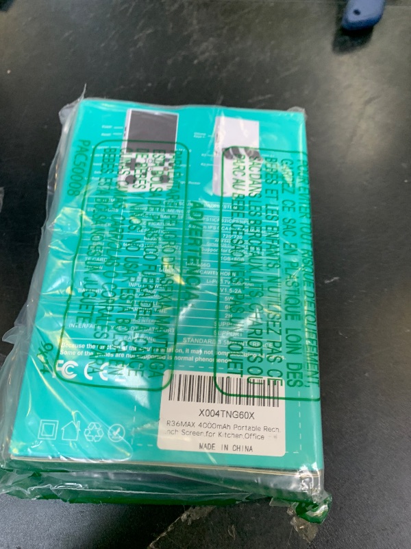 Photo 1 of ?R36MAX 4000mAh Portable Rechargeable Handheld Retro Game Console,Comfort Non-Slip Handheld Standing Retro Game Console with 64G TF Car,4.0-inch Screen,for Office,Black