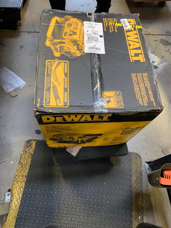Photo 1 of DEWALT Thickness Planer, 13-inch Wood Planer, Three Knife Two Speed, 15 Amp, 20,000 RPM Motor (DW735X)