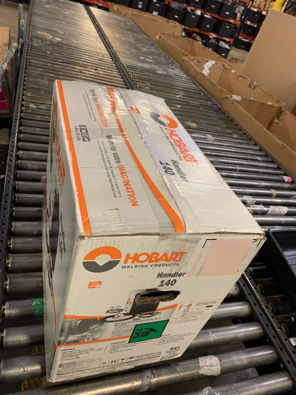 Photo 1 of Hobart Handler 140 MIG Welder 115V (500559 ) - Durable, Portable Wire Feed Welder Machine - Flux Core Welding Machine with Dual-Gauge Regulator - MIG Welding Machine Welds Up To 1/4 in. Mild Steel