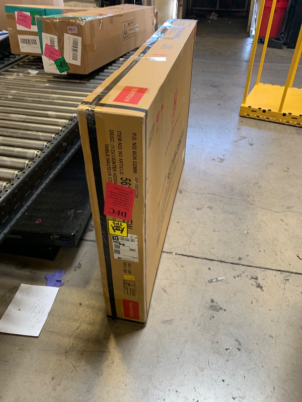 Photo 1 of Counter top height adjusted table 