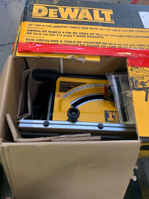 Photo 1 of Dewalt job site table saw 