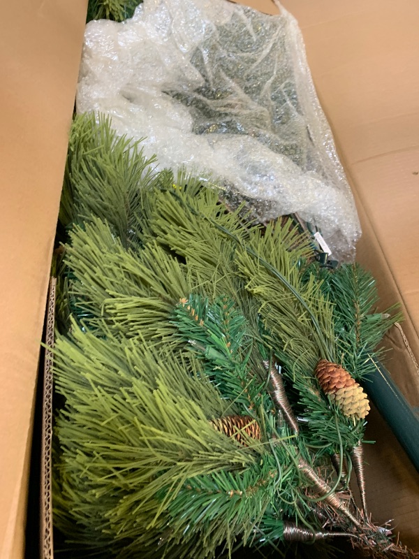 Photo 1 of National Tree Company 6.5 ft Pre-Lit Downswept Douglas Fir Slim Artificial Christmas Tree, 300 LED Lights, 640 Tips, PowerConnect, Foot Pedal, 10 Light Functions, Includes Stand, Green