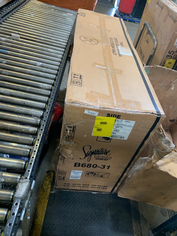 Photo 1 of Signature Design by Ashley Fortman Casual Dresser with 7 Storage Drawers and Tapered Feet, Round Metal Knobs" Satin Nickel-tone, Wood, 36" High, White