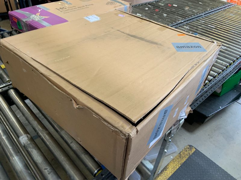 Photo 1 of Medline Premium Ultra-Lightweight Wheelchair with Flip-Back Desk Arms and Elevating Leg Rests for Extra Comfort, Black, 22” x 18" Seat