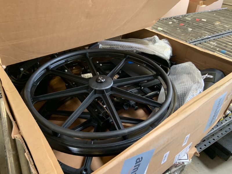 Photo 1 of Medline Premium Ultra-Lightweight Wheelchair with Flip-Back Desk Arms and Elevating Leg Rests for Extra Comfort, Black, 22” x 18" Seat