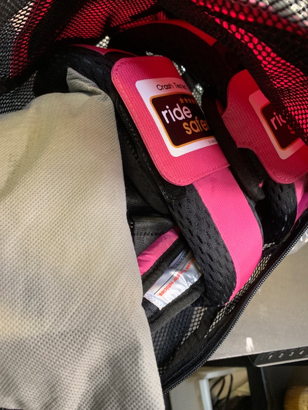 Photo 1 of RideSafer - Small Pink, Lightweight, Compact, Portable Car Seat - Perfect for Travel and Everyday Child Safety