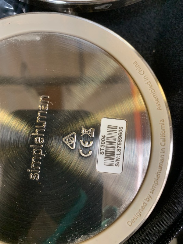 Photo 1 of simplehuman Sensor Mirror, 5" Round Rechargeable Mini Travel Makeup Mirror, 10x Magnification, Brushed Stainless Steel