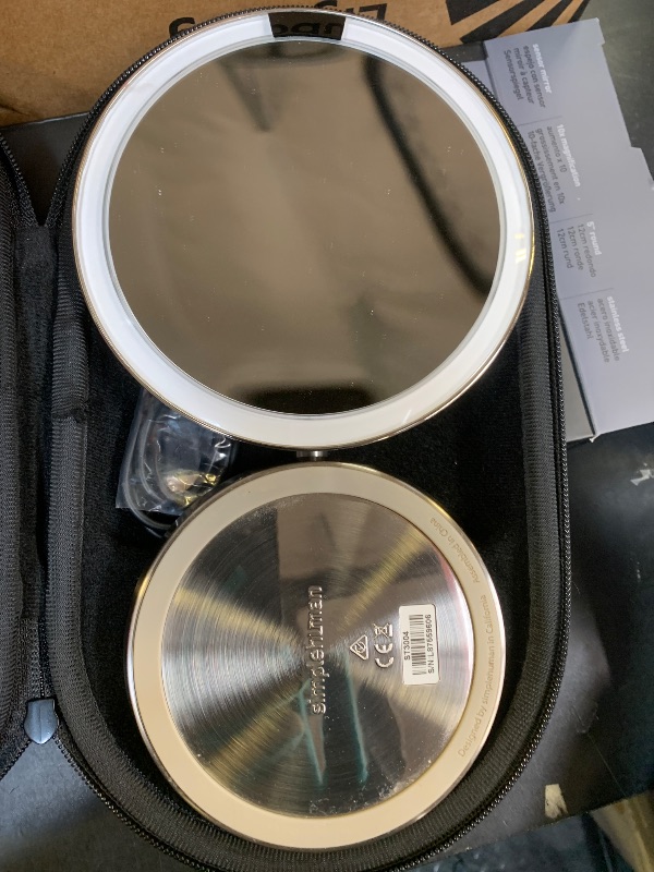 Photo 1 of simplehuman Sensor Mirror, 5" Round Rechargeable Mini Travel Makeup Mirror, 10x Magnification, Brushed Stainless Steel