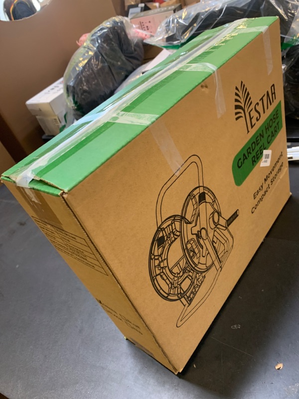 Photo 1 of  Garden hose wheel cart