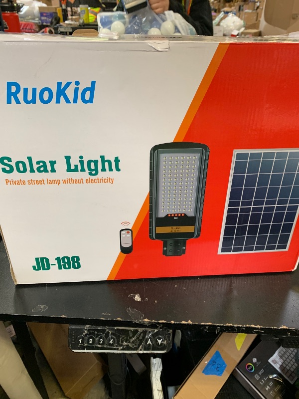 Photo 1 of RuoKid Solar Street Lights Outdoor Lamp, 16000lm IP67 Waterproof Light with Anti Broken Remote Control Mounting Bracket, Dusk to Dawn Security Led Flood Light for Yard, Garden, etc.