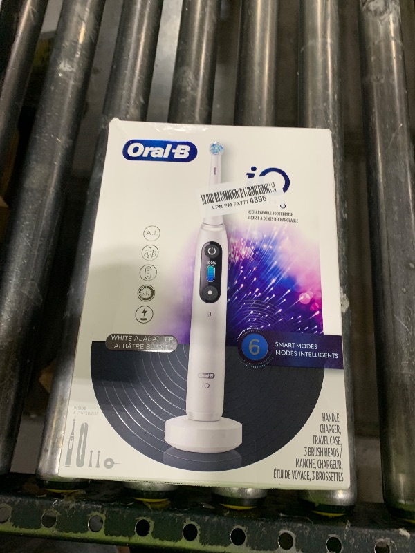 Photo 1 of Oral-B iO Series 8 Electric Toothbrush with 2 Replacement Brush Heads and Travel Case, Rechargeable Toothbrush, Whitealabaster