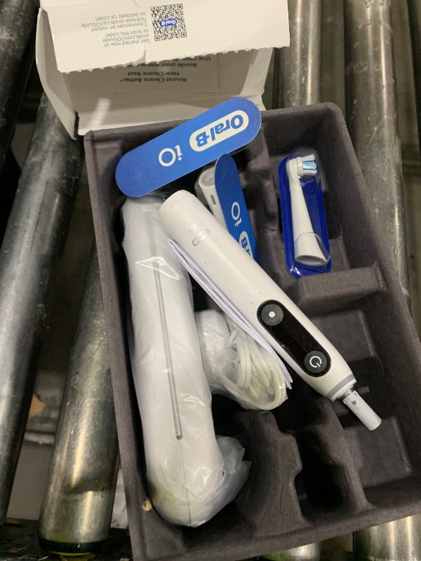 Photo 1 of Oral-B iO Series 8 Electric Toothbrush with 2 Replacement Brush Heads and Travel Case, Rechargeable Toothbrush, Whitealabaster