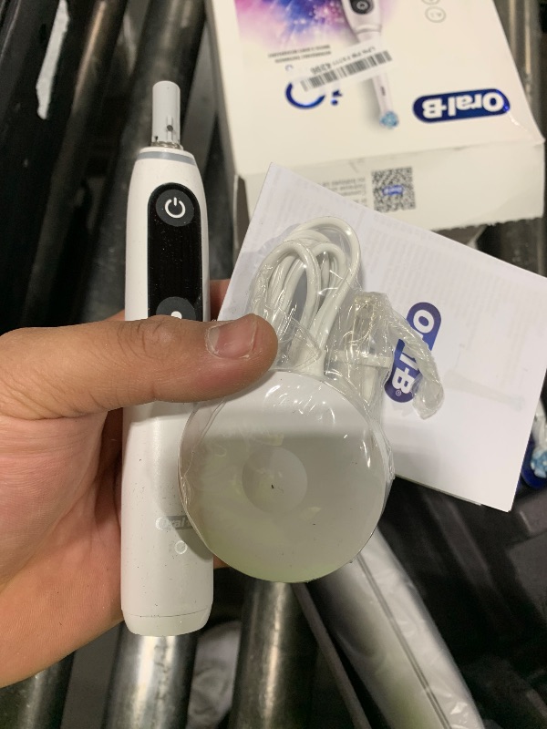 Photo 1 of Oral-B iO Series 8 Electric Toothbrush with 2 Replacement Brush Heads and Travel Case, Rechargeable Toothbrush, Whitealabaster