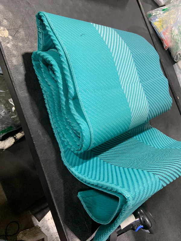 Photo 1 of UKISS Outdoor Rug Carpet?Reversible Portable Plastic Straw Camping Rugs? 8' x 10' Waterproof Mat? Large Outdoor Area Rugs for Patio?RV, Picnic, Backyard, Deck, Balcony, Porch, Beach, Green