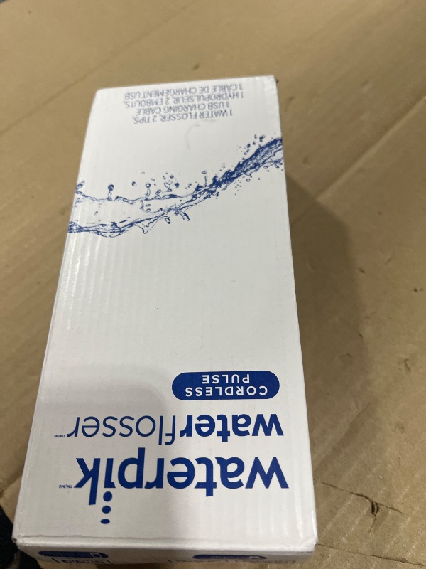 Photo 1 of Waterpik Cordless Pulse Rechargeable Portable Water Flosser for Teeth, Gums, Braces Care and Travel with 2 Flossing Tips, Waterproof for Shower, ADA Accepted, WF-20 Blue, Packaging and Tips May Vary