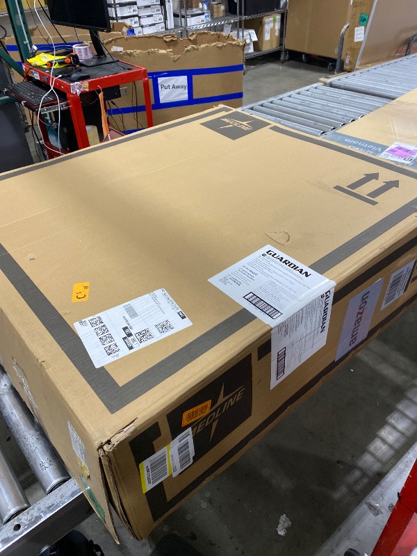 Photo 1 of Medline Comfortable Folding Wheelchair with Swing-Back, Desk-Length Arms and Elevating Footrests, 18”W x 16”D Seat,Black