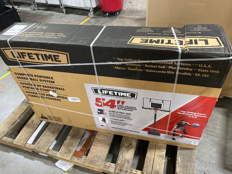 Photo 1 of Lifetime Adjustable Basketball Hoop, 54-Inch Shatterproof Polycarbonate Backboard, Slam-It Pro Rim, Adjustable Height 7.5-10 Ft, Portable Heavy-Duty Base with Wheels