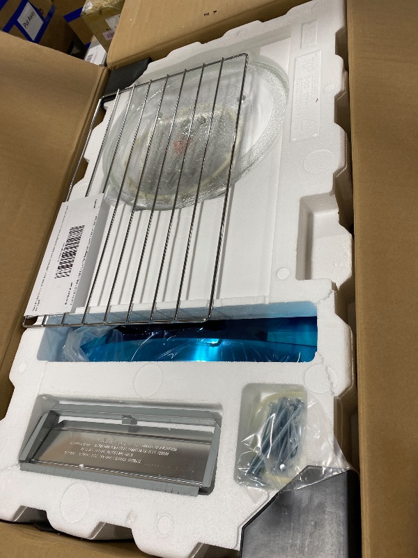 Photo 1 of BLACK+DECKER EM044KB19 Over The Range Microwave Oven with One Touch, 1000 Watts, 400 CFM and Auto Cooking, OTR 1.9 Cu.ft