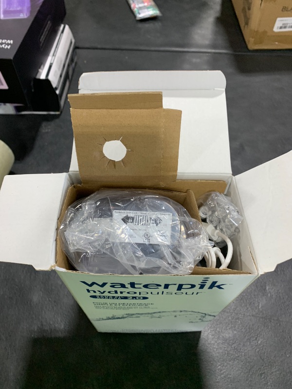 Photo 1 of Waterpik Cordless Advanced 2.0 Water Flosser For Teeth, Gums, Braces, Dental Care With Travel Bag and 4 Tips, ADA Accepted, Rechargeable, Portable, and Waterproof, Gray WP-587, Packaging May Vary