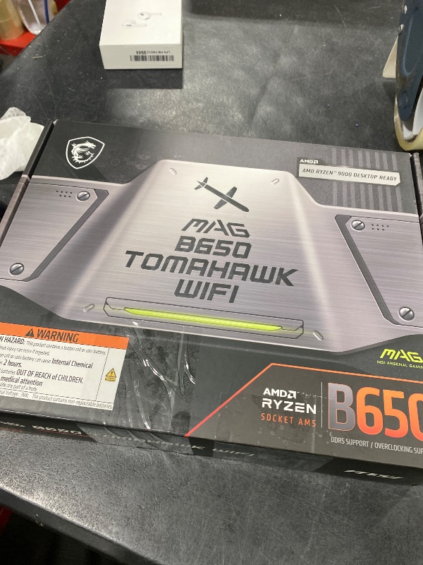 Photo 1 of MSI MAG B650 Tomahawk WiFi Gaming Motherboard (AMD Ryzen 9000/8000/7000 Series Processors, AM5, DDR5, PCIe 4.0, M.2, SATA 6Gb/s, USB 3.2 Gen 2, HDMI/DP, Wi-Fi 6E, Bluetooth 5.3, 2.5Gbps LAN, ATX)