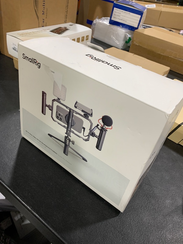 Photo 1 of SmallRig All-in-One Universal Quick Release Phone Video Rig Kit Pro, Phone Stabilizer Rig Kit with LED Light Microphone QR Tripod Dual Handles Power Bank Holder, for Creator & Live Streaming - 4704