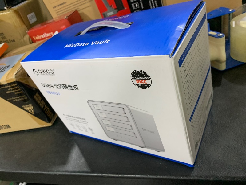 Photo 1 of **DAMAGED** ORICO 40Gbps SSD External Hard Drive Enclosure NVME M.2 All-Flash Docking Station Up 32TB for 4K/8K Video Editing/Data Transfer-8848U4